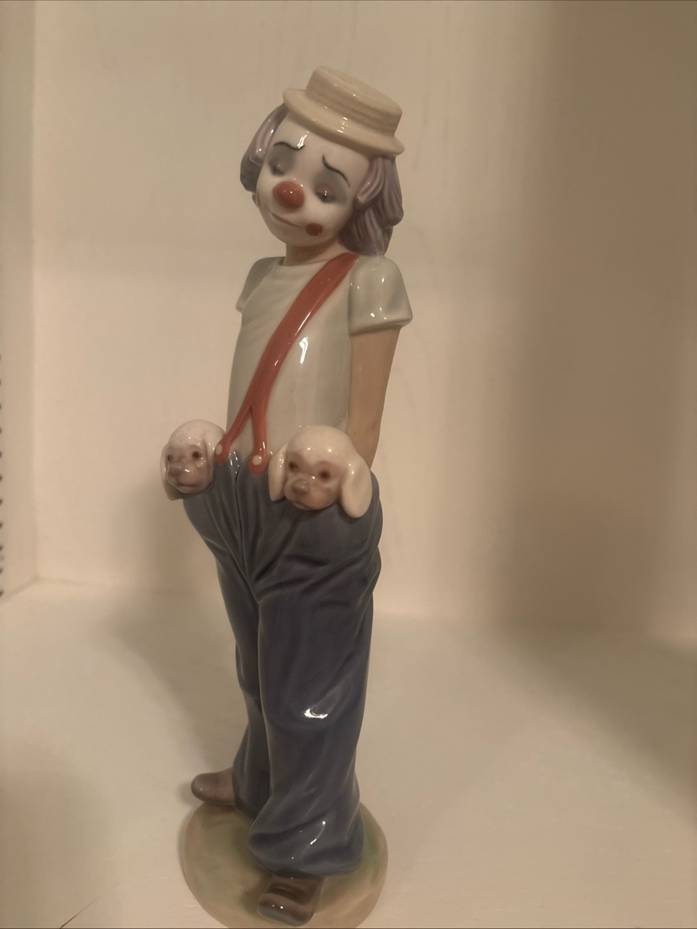 Lladro Porcelain Clown Figurine with Blue Pants and Red Suspenders
